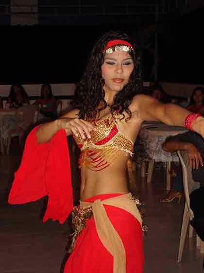 Gorgeous Cartagena woman dancing a traditional Cartagena dance